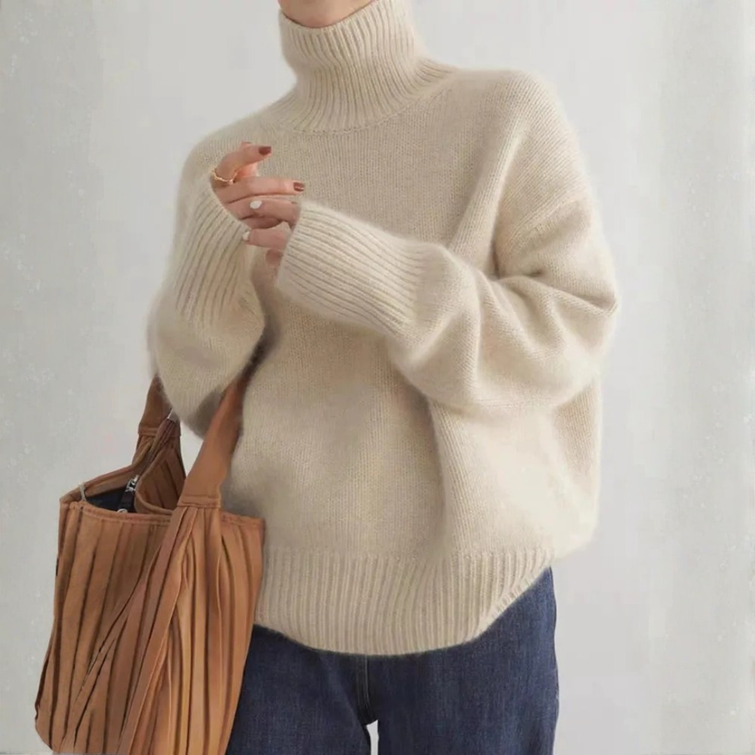 Damen Rollkragenpullover mit Rippbündchen in lockerer Passform